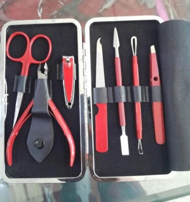 Kits de pedicura de menicura de peluquero rojo de calidad profesional de 7 piezas Foto 1 de 4