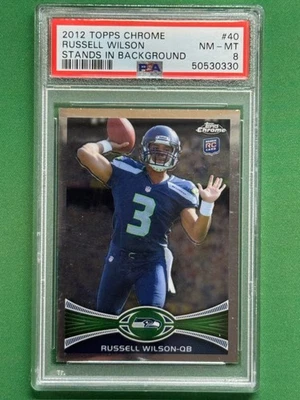 Soportes de fútbol americano Topps 2012 cromados en fondo #40 Russell Wilson RC PSA 8 Foto 1 de 2