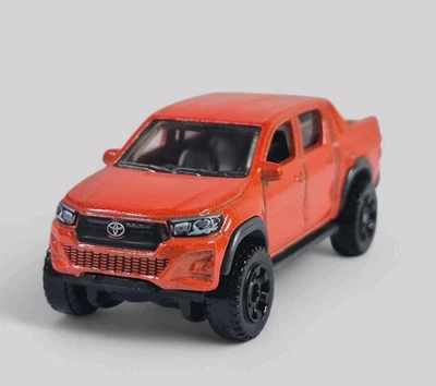 Camión Toyota Hilux 2018 diorama coleccionable modelo fundido a presión 1:64 naranja suelto Foto 1 de 4
