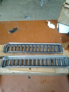 NOS 1971 BUICK ELECTRA/WAGON PAIR FRONT LOWER GRILLES IN BUMPER 1234361-1234360 - Picture 1 of 2