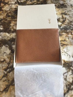 Cartera Rolex de cuero marrón Foto 1 de 3