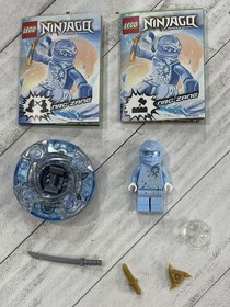 LEGO Ninjago: NRG Zane (9590)Minifigure w/ some weapons and spinner