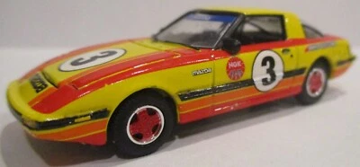 Johnny Lightning 1981 Mazda RX-7 amarillo suelto escala 1/64 Foto 1 de 4