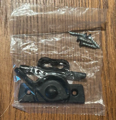 Kit/guardabarros de cerradura tradicional de ventana Andersen para doble suspensión 9069434 negro nuevo Foto 1 de 4