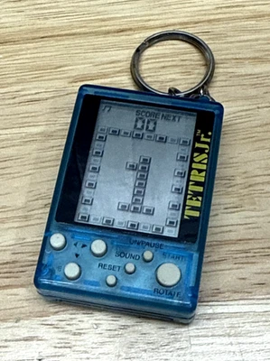 Llavero de Bolsillo Squaresoft Tetris Jr Portátil Electrónico LCD Juego Planeta Azul Foto 1 de 4