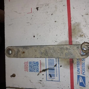 1975 Suzuki RL250  rear brake hub brace with spring - Picture 1 of 2