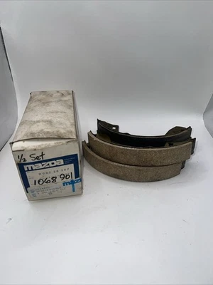 Sapato de freio traseiro Mazda genuíno NOS B092-26-38Z 1988-1989 323 626 MX6 LEIA!! - Imagem 1 de 4