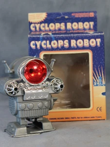 Robot Cyclops Accoutrements de colección cuerda chispa espacio juguete en caja funcionando 1995 - Imagen 1 de 6