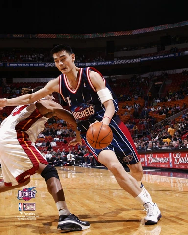 Yao Ming Houston Rockets Unsigned Dribbling Around Brian Grant Photo Cover