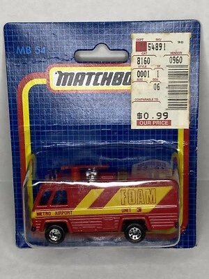 Matchbox - MB54 - Metro Airport Foam Fire Vehicle - 1987 Short Blue Card - New - Image 1 of 3
