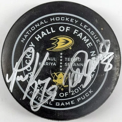   Paul Kariya/Teemu Selanne Firmado 2017 HOF Puck 9 707275 JSA LOA (tarjeta) Foto 1 de 2