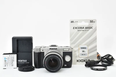 [Fast neuwertig] Pentax Q10 spiegellose Digitalkamera mit 5-15 mm F2.8-4.5... - Bild 1 von 4