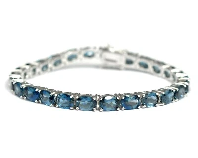 Brazalete de tenis de plata de ley 925 con piedras preciosas de topacio azul Londres natural de 7x5 mm  Foto 1 de 4