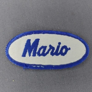 Parche insignia nombre azul ovalado cosido cursivo 'Mario' de 3" x 1,5" - Imagen 1 de 2
