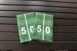 50 Yard Line Football 18" x 18" Napkins 1 Dozen - Picture 1 of 3