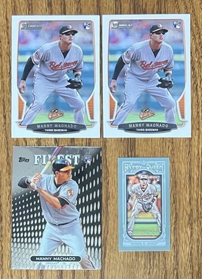 4 tarjetas de novato Manny Machado RC (2) Bowman #215 (1) Topps Finest #80 (1) GQ #85 Foto 1 de 2