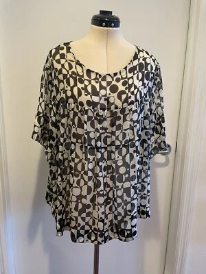 Top de seda Dries Van Noten blanco y negro estampado geométrico transparente talla 44 Foto 1 de 4