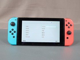 Nintendo Switch Console 32GB Handheld 720p w/ Neon Red/Blue Joy-Con HAC-001