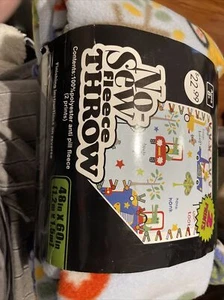 New Car No Sew Anti Pill Fleece 48x60 Throw Kit 2014. 2 Prints. Discontinued - Picture 1 of 1