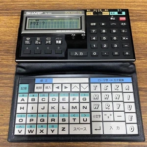 SHARP PA-500 Pocket Computer Retro Electronic Memo Database Unique Features New - Afbeelding 1 van 17