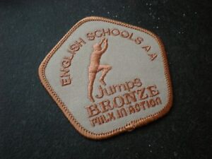 Vintage English Schools Athletics Association Badge Jumps Bronze Milk in Action