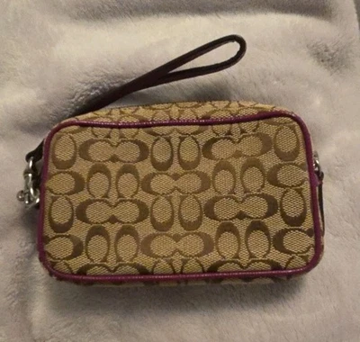 Muñequera Coach marrón tostado púrpura con cremallera vintage pequeña sin usar Foto 1 de 4