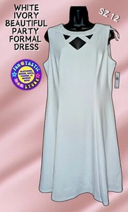 WOMENS PARTY FORMAL DRESS. WHITE IVORY. ALYX Brand. KNEE LENGTH w CUTOUTS. Sz 12 - Picture 1 of 17