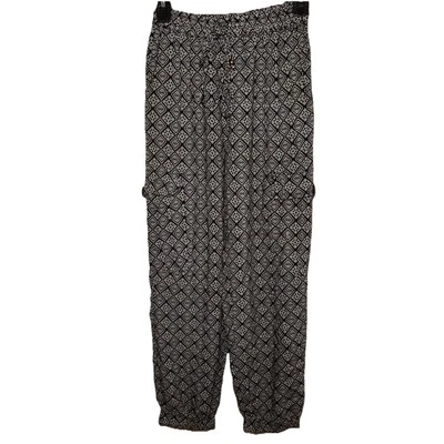 Pantalones para mujer Angie pequeños bohemios aztecas blancos y negros cintura elástica tobillos Foto 1 de 4