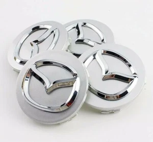 MAZDA Alloy Wheel Centre Caps. 4 x 56mm. Silver - Picture 1 of 3