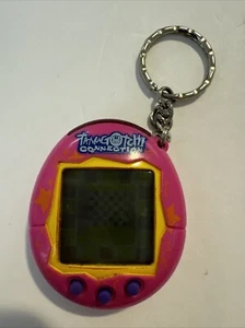 Bandai Tamagotchi Connection Rosa Giallo Stelle 2004 Testato - Foto 1 di 3