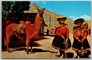 Postcard Pisac Peru Native Girls on the Way to the Market with Llama - Picture 1 of 2