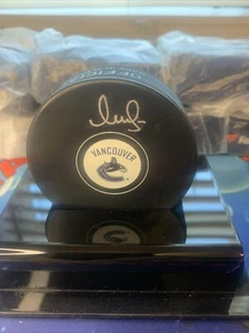 Vasily Podkolzin Fanatics Signed Puck - Picture 1 of 3