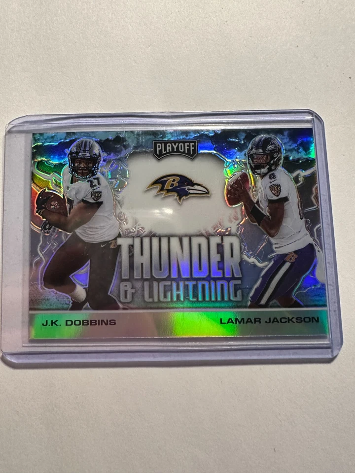 K24,211- 2020 Playoff Thunder and Lightning Silver #1 J.K. Dobbins/Lamar Jackson - Image 1 of 1