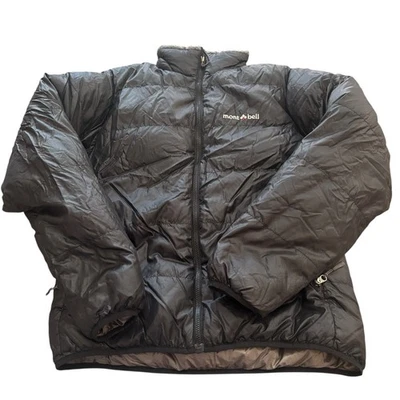 Chaqueta acolchada Montbell para hombre M negra plumón de ganso aislada bolsillos con cremallera cremallera completa Foto 1 de 4