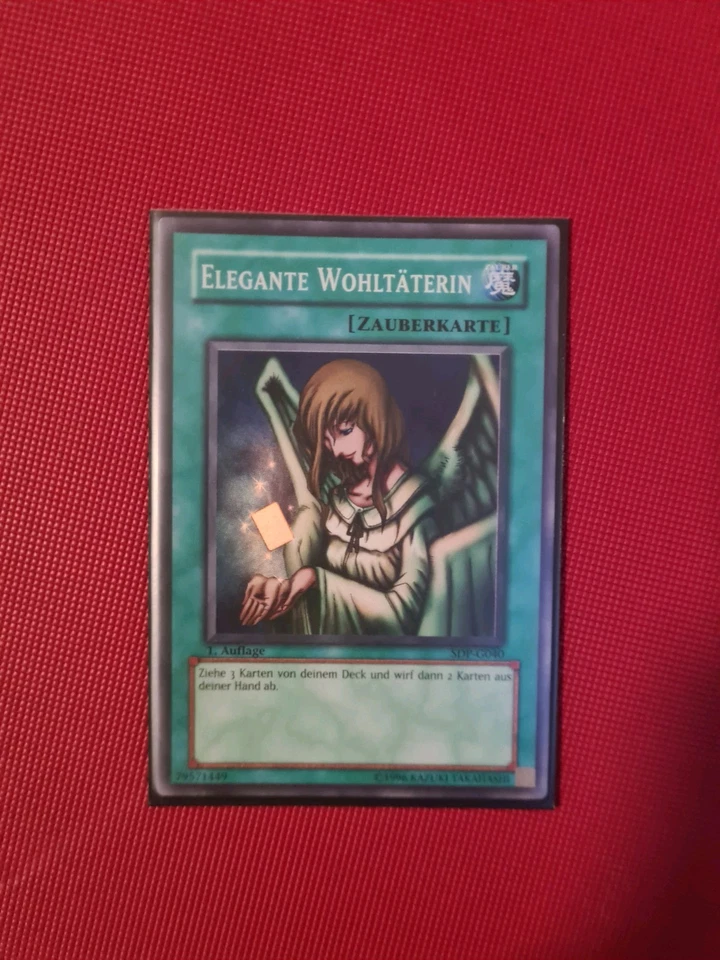 Yu-Gi-Oh Elegante WOHLTÄTERIN, SDP-G040 Super Rare, Deutsch, 1. Auflage - Bild 1 von 1