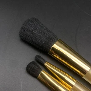 Vintage NEW Estee Lauder 3 Pc. Makeup Brush Set Gold Tone - Picture 1 of 7