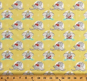 Cotton Dumbo the Flying Elephant Circus Yellow Disney Fabric Print BTY D686.18 - Picture 1 of 1