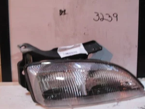 Right Passenger Headlight Fits 95-99 Cavalier B-3239 - Picture 1 of 2