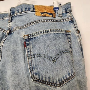 Pantalones de mezclilla para hombre Levi's 550 36 x 34 de ajuste relajado medianos lavados en piedra pestaña roja envejecidos - Imagen 1 de 12