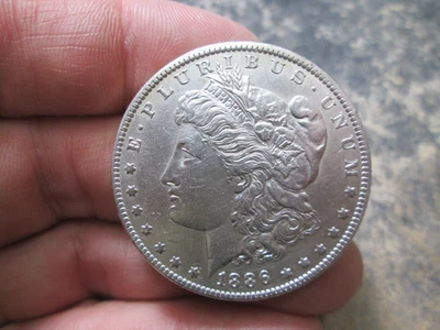 1896 O US MORGAN SILVER DOLLAR IN UNCIRCULATED CONDITION CLEANED - Image 1 of 2