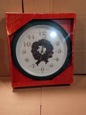 The Original Caroling Wall Clock New Christmas Carols Light Sensor Green Wreath - Image 1 of 2