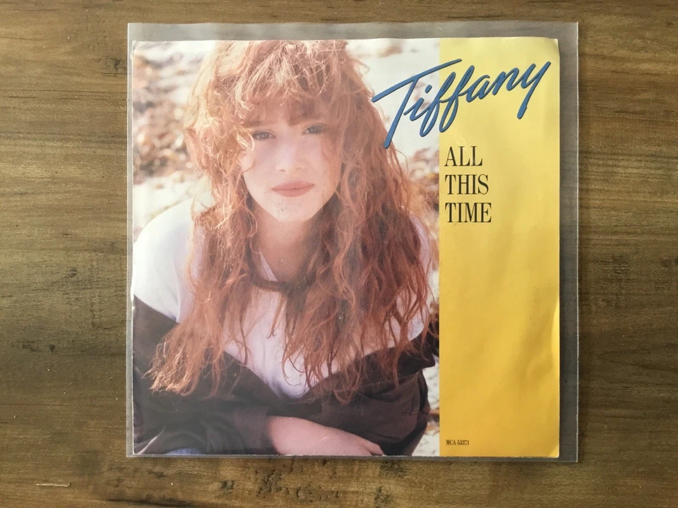 TIFFANY ‘All This Time’ b/w ‘Can’t Stop A Heartbeat’ 7” WLP Vinyl Record 1988 - Image 1 of 1