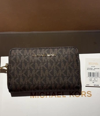 PORTAFOGLIO MICHAEL KORS JET SET SM ZIP AROUND CARD CASE MARRONE autentico nuovo con etichetta - Immagine 1 di 4