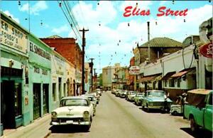 Nogales, Sonora Mexico  ELIAS STREET SCENE Cavern Cafe~50's Cars~Vendor Postcard