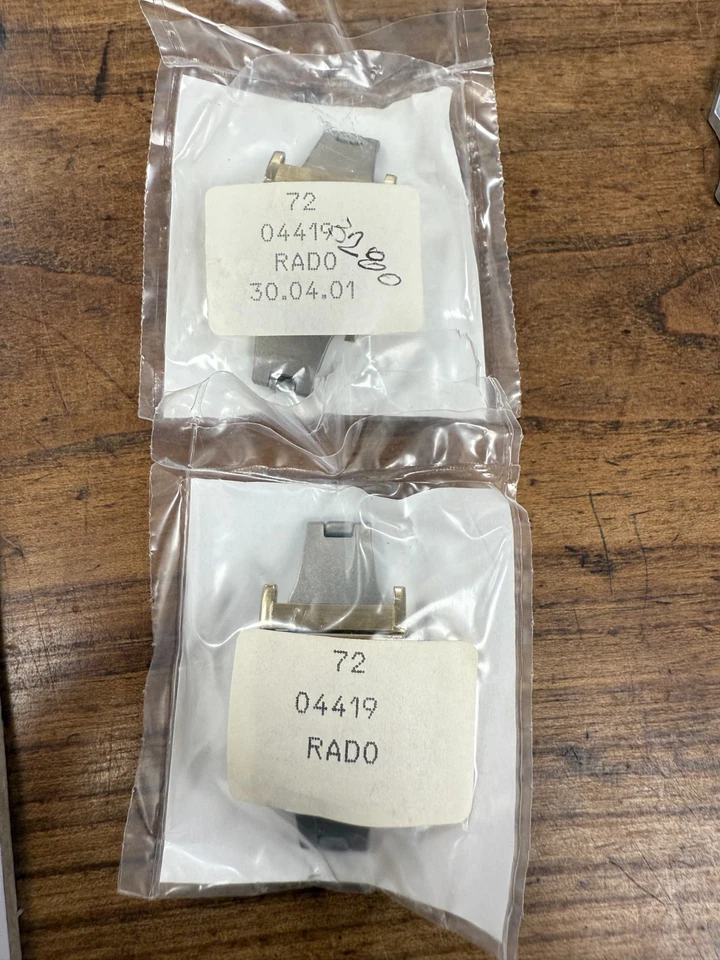 Cierre Rado 04419 original Nuevo cierre plegable de titanio amarillo de 18 mm con pasadores Foto 1 de 1