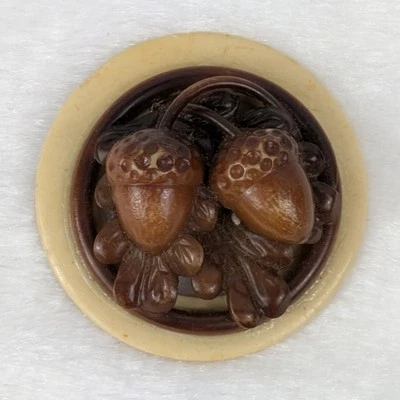 Marion Weeber 1.625" Carved Acorn Celluloid Button Glued to Cream Buckle Base - Image 1 of 4