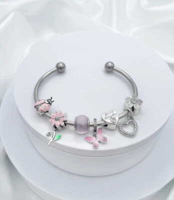 Linx Stainless Steel Bangle with Granddaughter Themed Charms 925 Sterling Silver - Image 1 of 4