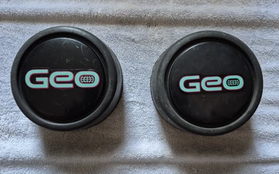 Пара (2) стальных центральных колпаков 15 дюймов 1991-1998 Geo Tracker - Изображение 1 из 4