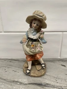 Vintage Girl Sitting with Flowers Porcelain Figurine 6.5” - Picture 1 of 2