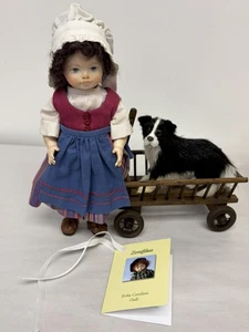 KÜNSTLERIN ERIKA CATELLANI HOLZPUPPE "MARIA" UND IHR HUND IM WAGEN 17/20 - Bild 1 von 10